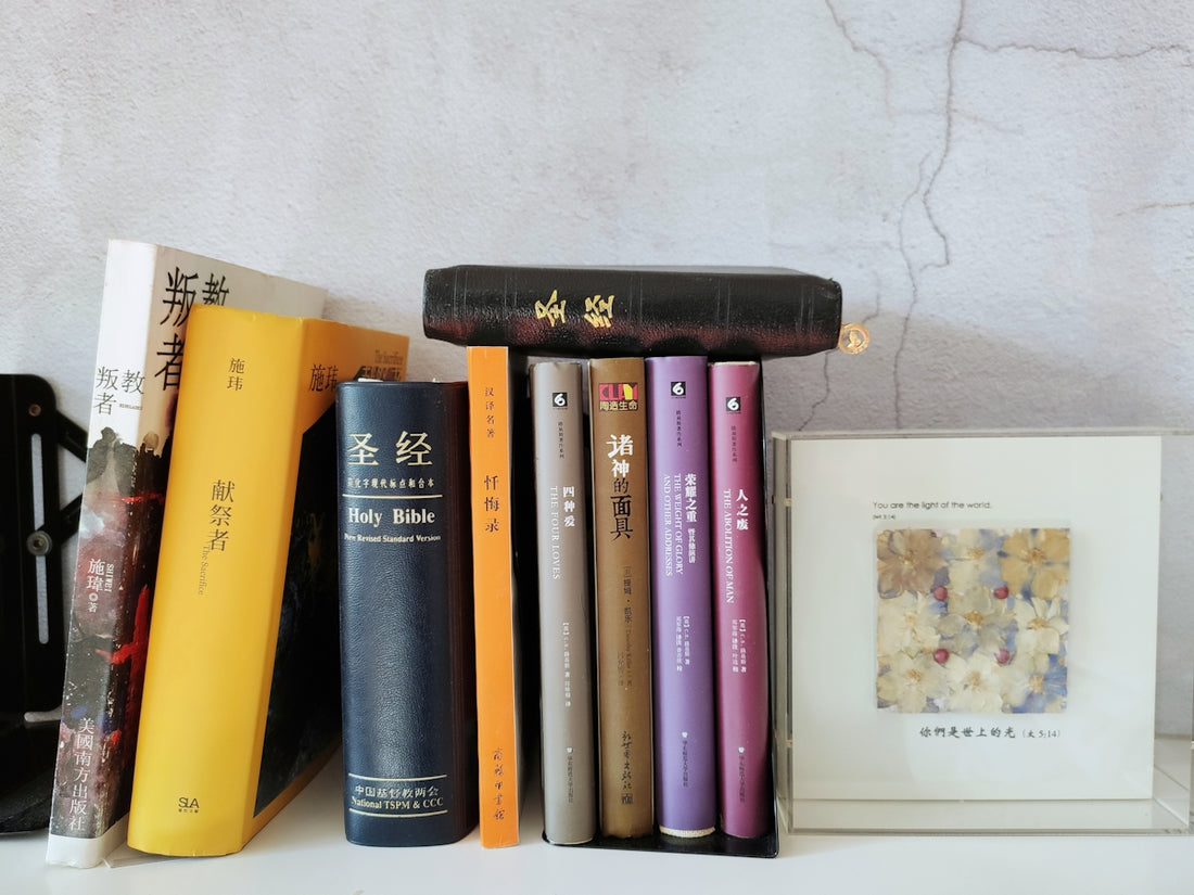 yellow and purple books on white table